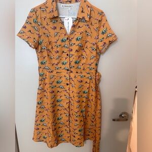 Sm Mrs frizzle dress! Mustard colored dinosaur print dress WITH POCKETS! NWT